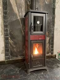 Чугунная печь-камин La Nordica GEMMA FORNO 5.0 7 кВт с варочной поверхностью на дровах (бордовая керамика) 7111720 фото